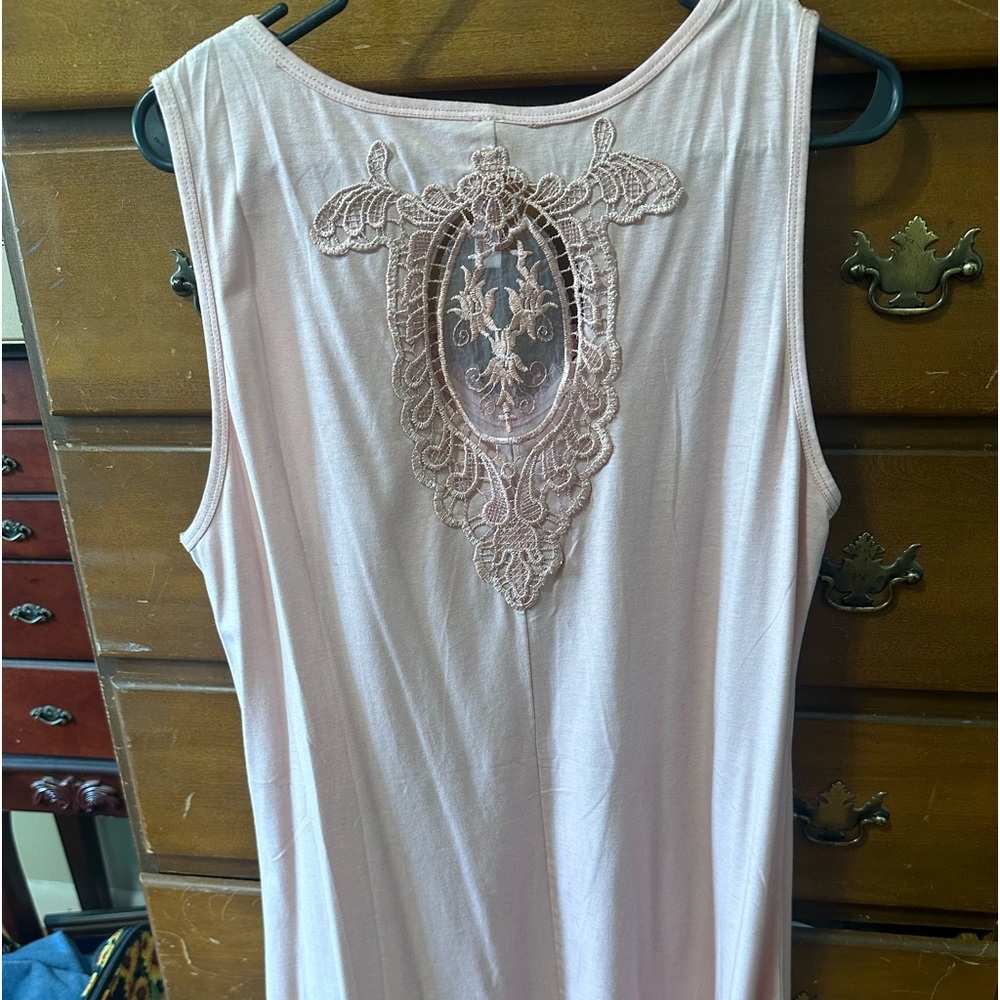 Women’s top or dress if preferred